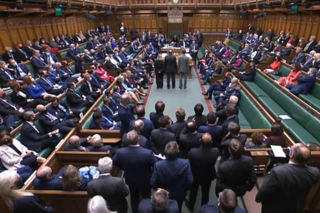 MPs announcing the result of a vote for Coronavirus regulations, in the House of Commons in London, as MPs have voted 369 to 126, majority 243, to approve the mandatory use of Covid passes for entry to nightclubs and large venues in England. Picture date: Tuesday December 14, 2021.