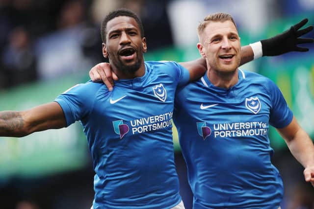 Omar Bogle celebrates his final Pompey goal against Scunthorpe with Lee Brown. Picture: Joe Pepler