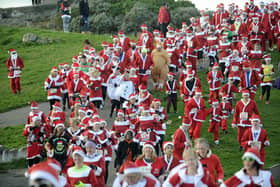 Christmas is coming! The Christmas Cracker Challenge Santa Fun Run held on Southsea Seafront in 2018. Picture Ian Hargreaves  (181209-1_jumper)