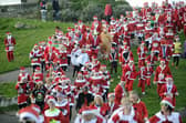 Christmas is coming! The Christmas Cracker Challenge Santa Fun Run held on Southsea Seafront in 2018. Picture Ian Hargreaves  (181209-1_jumper)