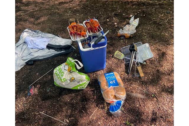 Caption: Police have threatened to destroy all these items abandoned by a large group of motorcyclists who fled after being caught breaking lockdown laws to have a picnic in woodland at Dunsbury Hill. Photo: Havant police