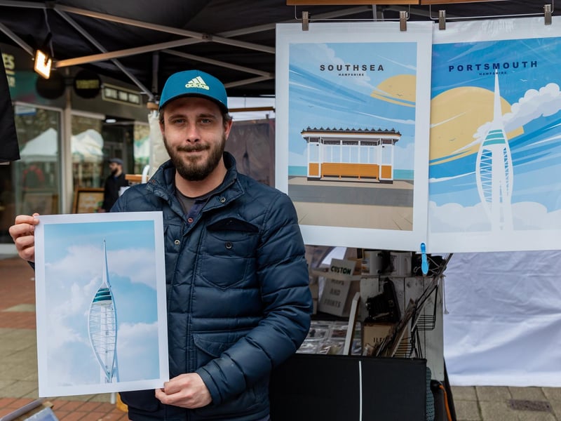 Love Southsea market has returned as Portsmouth heads into Spring. Pictured is Jamie Harknett (32) from Southsea Studio with his stunning local pictures and artwork. Picture: Mike Cooter (160324)
