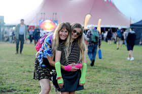 Natalie and Maddie Fisk (9), from Southampton, enjoying Wickham Festival 2025.  Picture: Sarah Standing (310725-1224)
