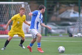 Harvest (yellow) v Overton. Picture by Martyn White