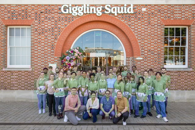 Giggling Squid will be officially opening the doors of its brand new venue in Gunwharf Quays on July 30. The former Loch Fyne site has been transformed into a botanical paradise with exceptional decor. Pictured: The staff at Giggling Squid Picture: Giggling Squid