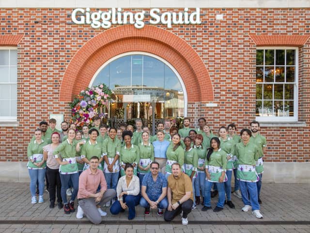 Giggling Squid will be officially opening the doors of its brand new venue in Gunwharf Quays on July 30. The former Loch Fyne site has been transformed into a botanical paradise with exceptional decor. Pictured: The staff at Giggling Squid Picture: Giggling Squid