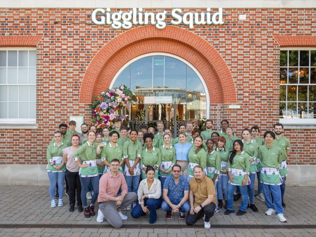 Giggling Squid will be officially opening the doors of its brand new venue in Gunwharf Quays on July 30. The former Loch Fyne site has been transformed into a botanical paradise with exceptional decor. Pictured: The staff at Giggling Squid Picture: Giggling Squid