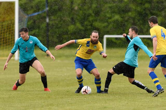 Meon Milton's Adam Beckett on the ball against Burrfields. Picture: Keith Woodland