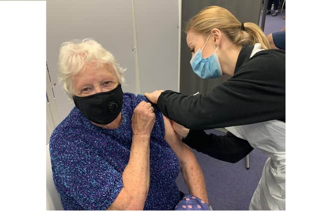 Barbara Titley from Fareham getting her Covid booster jab at Lalys Pharmacy