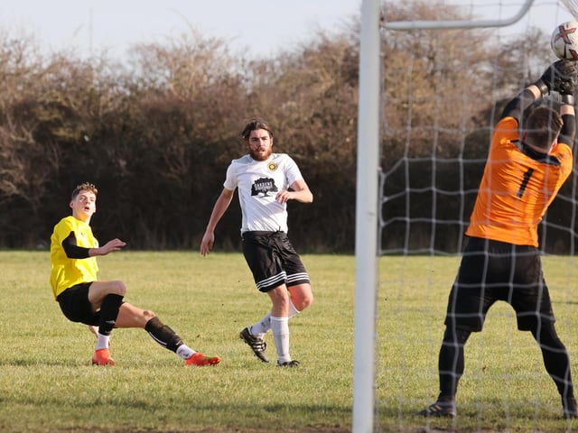 Pompey Chimes keeper makes a save. Picture by Kevin Shipp