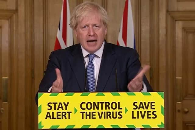 Prime Minister Boris Johnson speaking during a media briefing in Downing Street, London in July. PA Video/PA Wire
