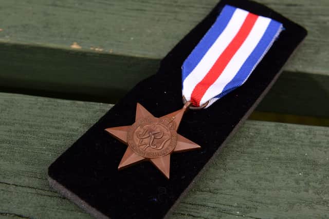 The medal that was uncovered in London
Photo: Simon Czapp/Solent News