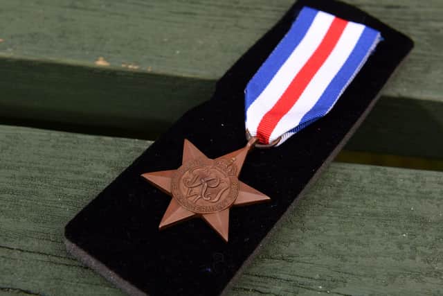 The medal that was uncovered in London 
Photo: Simon Czapp/Solent News