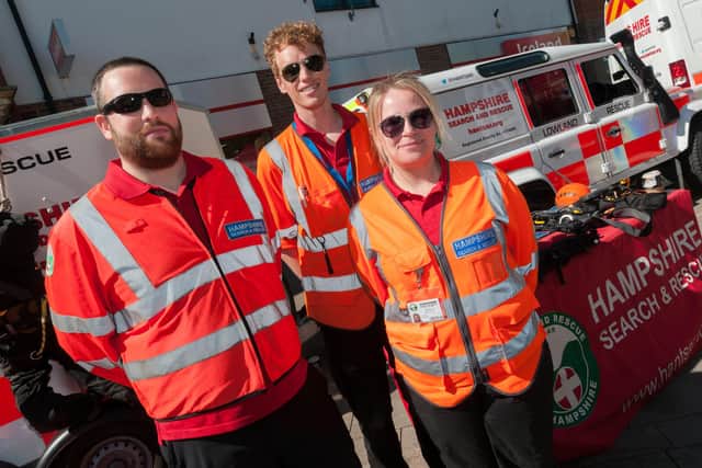 Hampshire Search and Rescue is helping to run a PPE hub for health workers in need of protective clothing during the coronavirus health crisis. Pictured are technical rescue team members Luke Stonestreet, left, Tom Entwistle, Amy Wells, right, during an event in Fareham in June 2018.
Picture: Duncan Shepherd