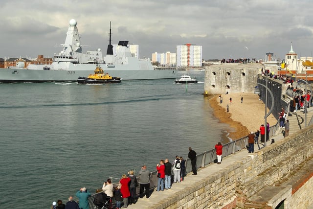 The Royal Navy Type 45 Destroyer HMS Dauntless sets sail from Portsmouth for the Falklands Islands on her maiden deployment. PRESS ASSOCIATION Photo. Picture date: Wednesday April 4, 2012. Scores of well-wishers lined the harbour walls as HMS Dauntless, the second of the navy's hi-tech Type 45 air defence destroyers, left its home port of Portsmouth Naval Base for its maiden mission. See PA story DEFENCE Falklands. Photo credit should read: Chris Ison/PA Wire