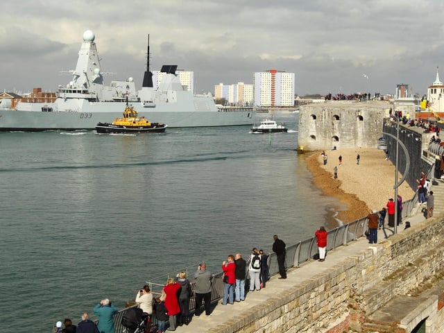 The Royal Navy Type 45 Destroyer HMS Dauntless sets sail from Portsmouth for the Falklands Islands on her maiden deployment. PRESS ASSOCIATION Photo. Picture date: Wednesday April 4, 2012. Scores of well-wishers lined the harbour walls as HMS Dauntless, the second of the navy's hi-tech Type 45 air defence destroyers, left its home port of Portsmouth Naval Base for its maiden mission. See PA story DEFENCE Falklands. Photo credit should read: Chris Ison/PA Wire