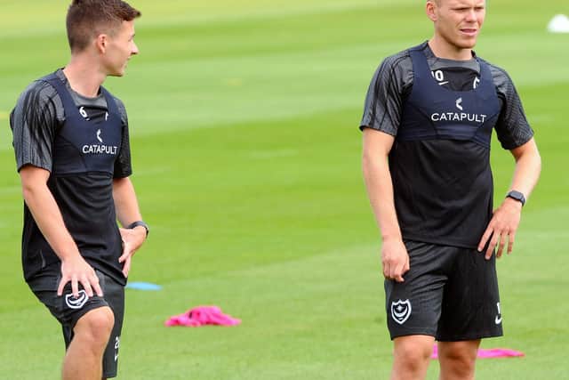 Anthony Scully (right) with Tom Lowery on the first day of Pompey pre-season training on Thursday. Picture: Sarah Standing (290623-8847)