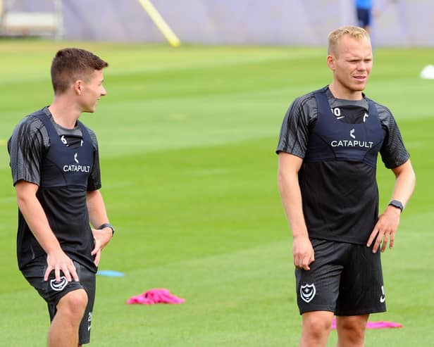 Anthony Scully (right) with Tom Lowery on the first day of Pompey pre-season training on Thursday. Picture: Sarah Standing (290623-8847)