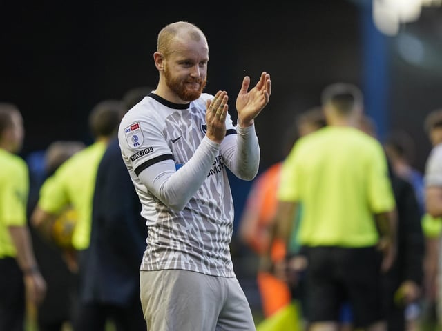 Connor Ogilive applauds the Pompey fans at the final whistle
