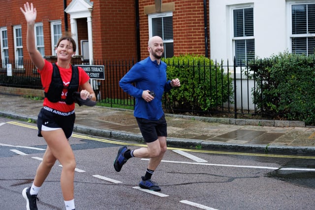 Runners hit the streets in wet and windy conditions despite The Great South Run being cancelled.