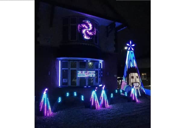 Kelly and Myles Semmens from Cosham raised more than £1,000 for Home Start Portsmouth by holding daily Christmas light shows outside their home