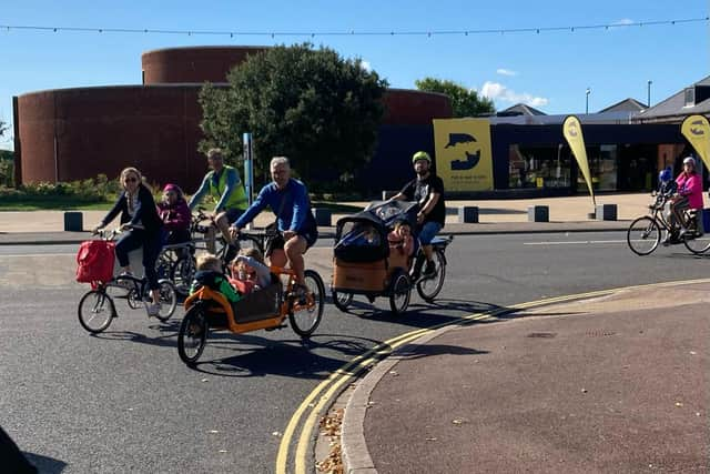 Cycling outside The D-Day Story. 