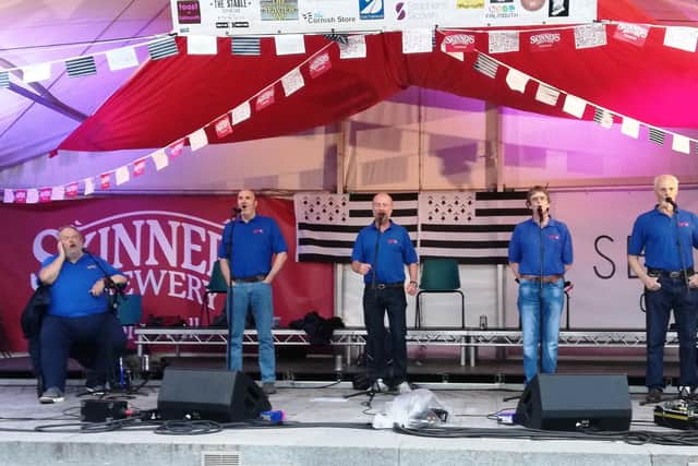 The Portsmouth Shantymen performing on Falmouth main stage 2019