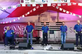 The Portsmouth Shantymen performing on Falmouth main stage 2019