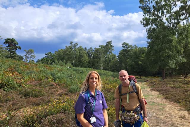 South Downs National Park Authority of Olivia French engagement officer for Heathlands Reunited and charity hiker Henry Rawlings on the Serpent Trail. Picture: Jeff Travis/PA