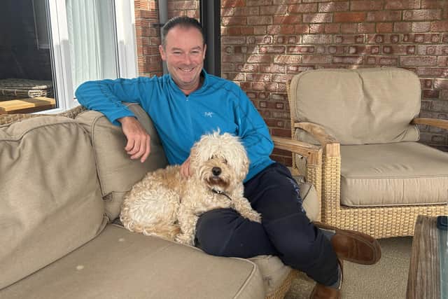 Rob Styles relaxing with his dog, Dexter. The former Premier League referee has recently received the all-clear after suffering from throat cancer.