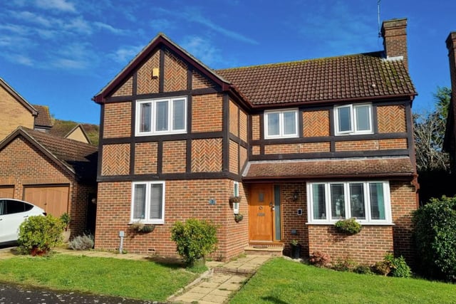 This property comes with four bedrooms, two bathrooms and four reception rooms.