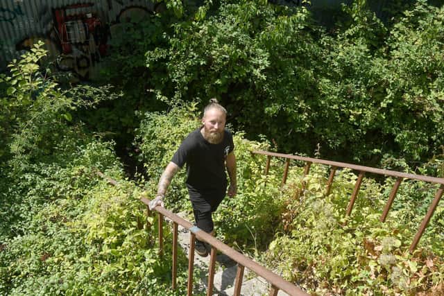 Colin Smith (37) from Southsea, otherwise known as The Bearded Explorer, is now a full time urban explorer.

Picture: Sarah Standing (260822-2290)