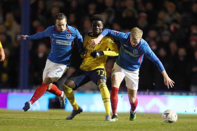 Ross McCrorie (right) was one of six changes for the visit of Arsenal as Kenny Jackett looked to protect his players. Picture: Joe Pepler