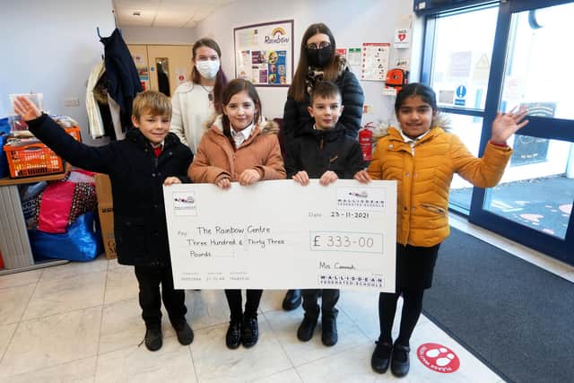 From left: Emma Dean, senior income development for The Rainbow Centre, Miss Bowser, then kids, Flynn, seven, Lexie, 10, Freddie, eight, Karpagam, nine. Picture: Sam Stephenson