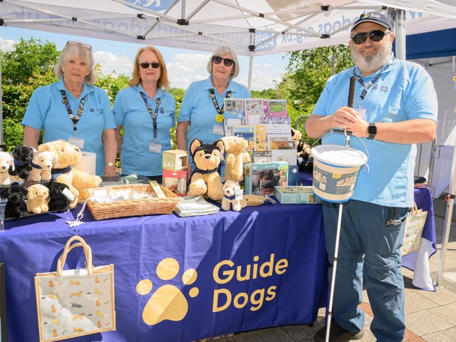 Myra Pritchard, Anne Cook, Jenny Smith and Bill Burbin at the Guide Dogs stallPicture: Keith Woodland (250521-2)