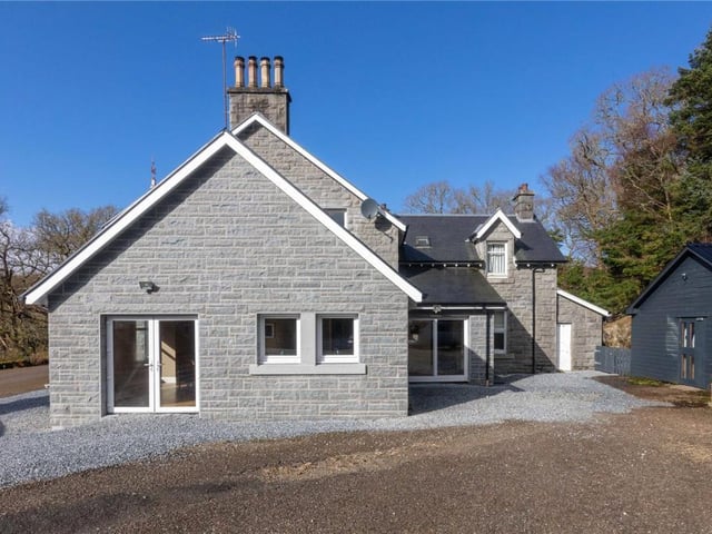 Side of property showing extension.