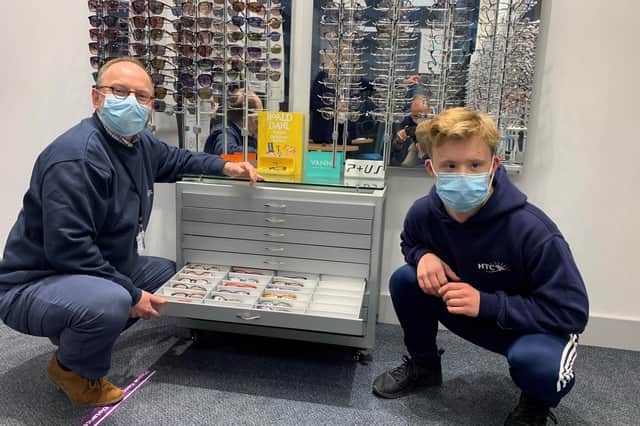 Dispensing optician Ian Rampton and Max Ross at the University of Portsmouth Eye Clinic