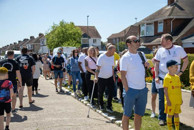 Queues building outside Privett Park.
Picture: Alex Shute