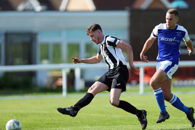 Hayling's Harry Frost (left) v Denmead. Picture: Chris Moorhouse