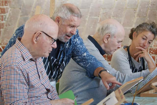Roy Eneas  (second left) and Abi Wheeler (right), are the faciltators for the Generate project run by Aspex, for people with dementia and their carers.