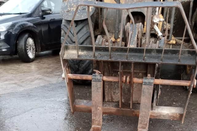The agricultural vehicle which slammed into the Mitsubishi.