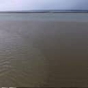 A large sewage water plume is pictured spreading out across Langstone Harbour last year. Photo: Mathew Orchard