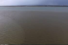 A large sewage water plume is pictured spreading out across Langstone Harbour last year. Photo: Mathew Orchard