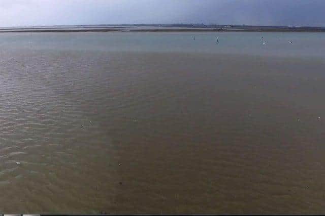 A large sewage water plume is pictured spreading out across Langstone Harbour last year. Photo: Mathew Orchard