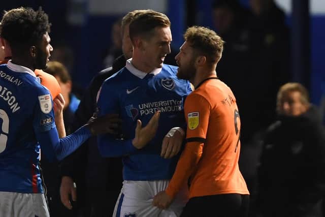 PORTSMOUTH, ENGLAND - NOVEMBER 24: Tempers fray after the full time whistle of the Sky Bet League One match between Portsmouth and Oxford United at Fratton Park on November 24, 2020 in Portsmouth, England. Sporting stadiums around the UK remain under strict restrictions due to the Coronavirus Pandemic as Government social distancing laws prohibit fans inside venues resulting in games being played behind closed doors. (Photo by Mike Hewitt/Getty Images)