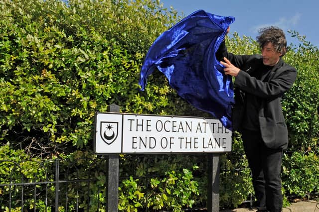 Neil Gaiman opens The Ocean at the End of the Lane on Southsea seafront in 2013 Picture: Malcolm Wells (132290-7653)