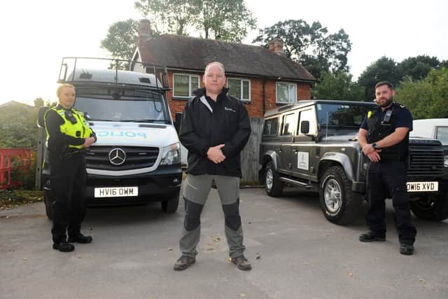 Modern slavery police operation on Hayling Island on Friday, involcing (l-r) PC Kat Bowden, Richard Burgess, regional crime officer for the Home Office Gangmasters and Labour Abuse Authority and immigration officer Matthew Cragg. Picture: Sarah Standing (180920-4285)