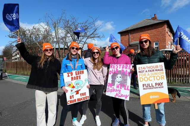 From left - Dr Emma Norris, Dr Bea Gardner, Dr Cloe Parfitt, Dr Lindsay Merry and Miss Libby Brewin on a picket line outside QA Hospital on Thursday. Picture: Chris Moorhouse