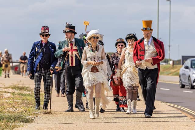 Punks on Parade: members of the Gosport Steampunk Society during their promenade along Stokes Bay. Picture: Mike Cooter (040922)