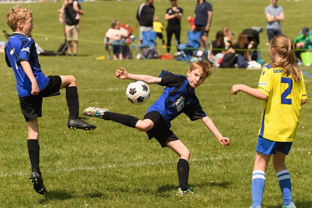Action from the Clanfield youth football tournament at Horndean Technology College. Picture: Keith Woodland (270521-757)